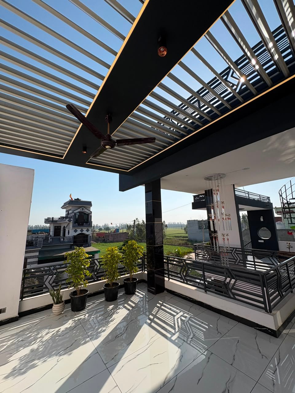 Motorised louvre roof installed on a balcony